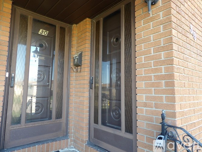 A building with a number 30 on the door.