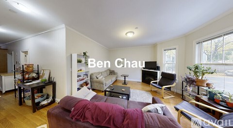 A living room with a couch and a coffee table.