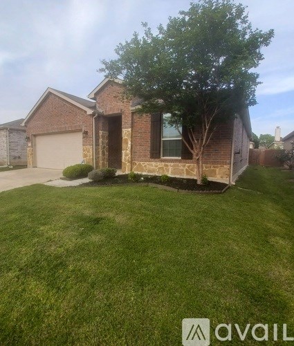 A house with a tree in front of it.
