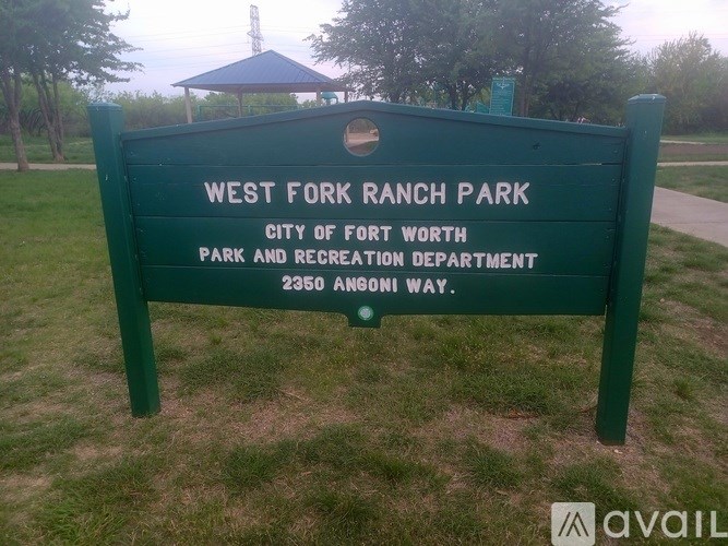 A green sign that says West Fork Ranch Park.