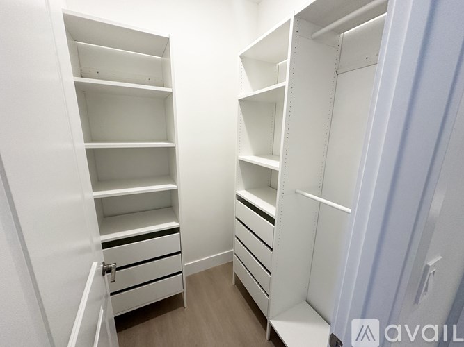 A bathroom with a vanity and a mirror.