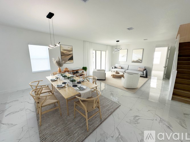 A modern dining room with a marble floor and a table set for a meal.