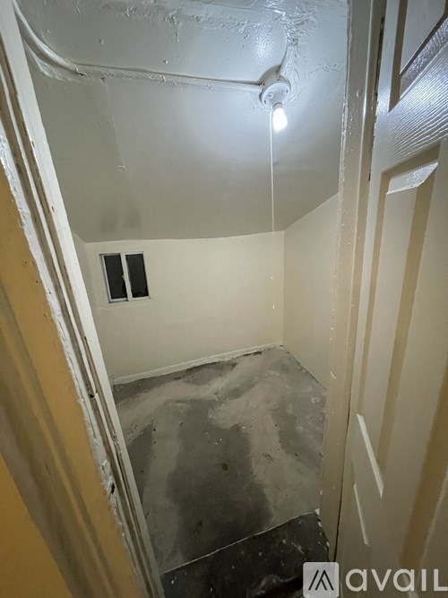 A dirty bathroom with a toilet and a shower.