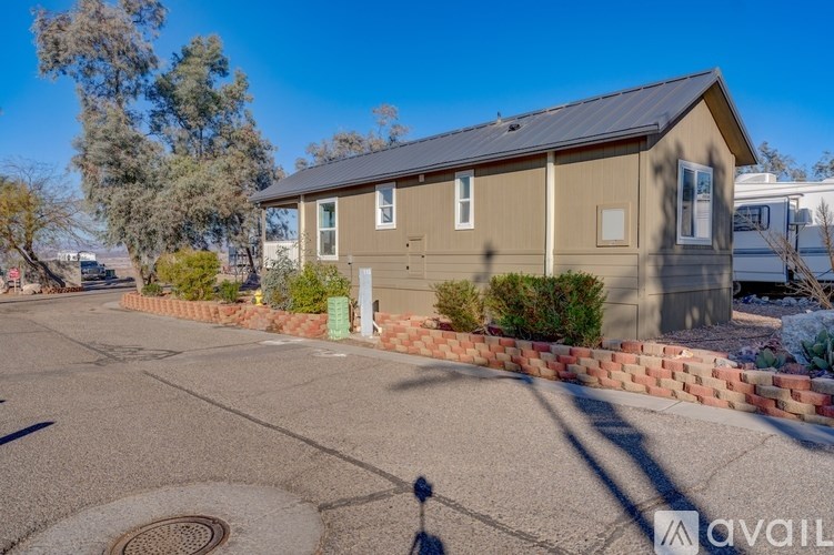 A house with a driveway in front of it is for sale.