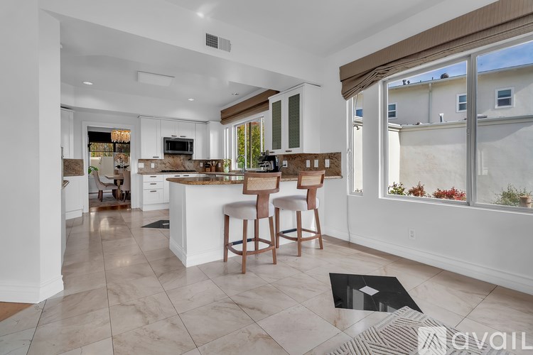 A wooden shelf with towels and toiletries on it.