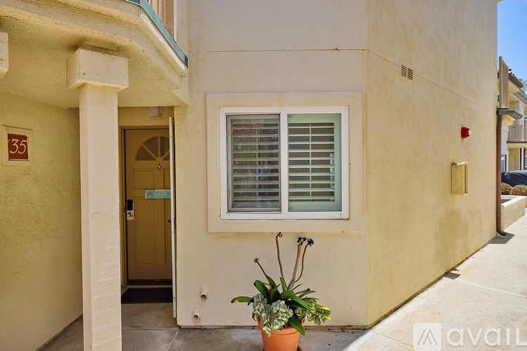 A small house with a door and window.
