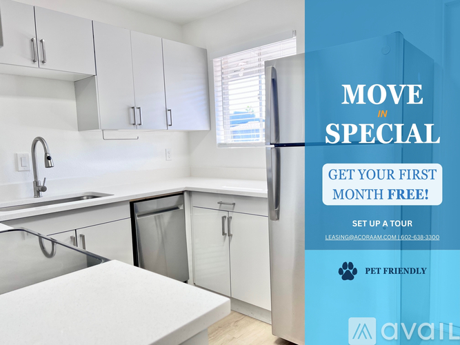 A kitchen with a sign offering a free first month for a move-in special.