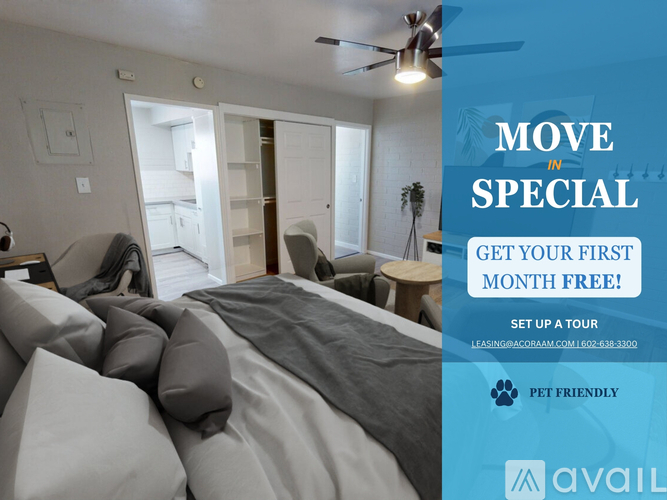 A bedroom with a bed, pillows, and a ceiling fan, with an advertisement for a move special offering a free first month.