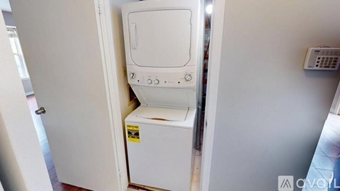 A white oven is installed in a kitchen.