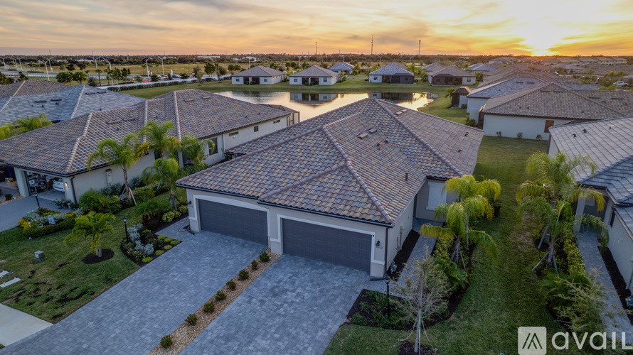 A house with a garage is available for sale.
