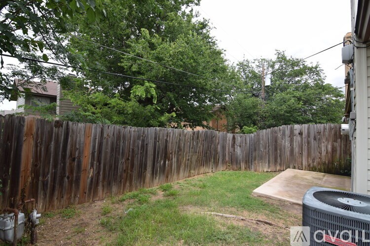 A room with white walls and a carpeted floor.