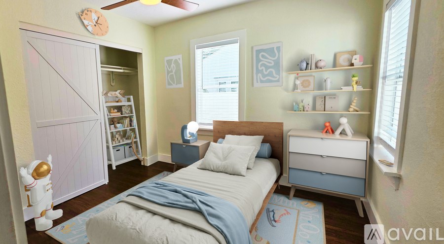 A bedroom with a bed, nightstand, and a dresser with a mirror above it.