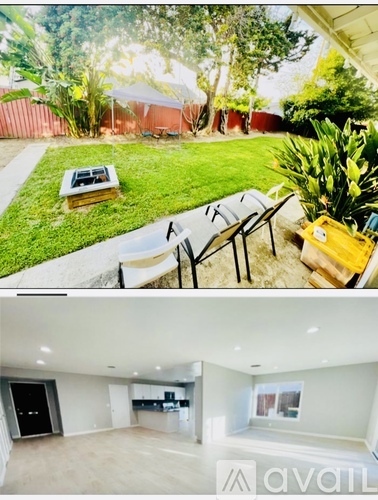 A house with a backyard and a living room.