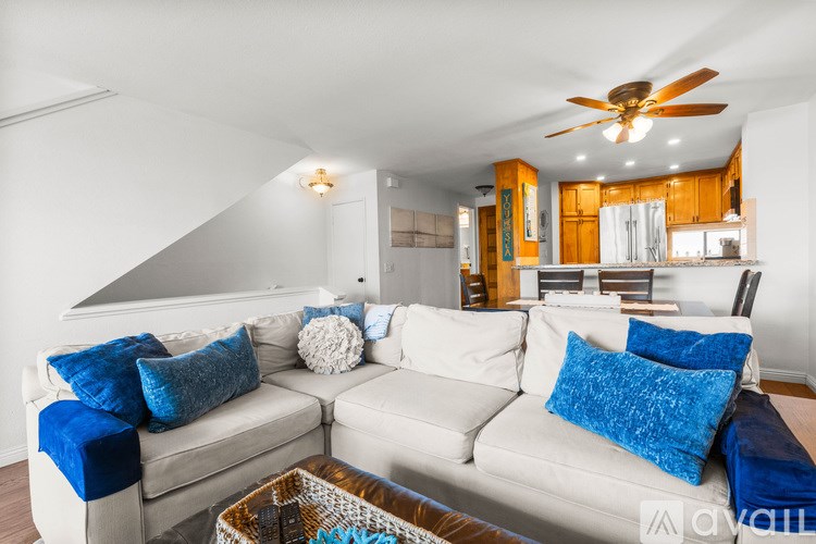 A living room with a fireplace and a couch.