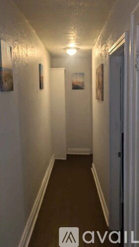 A white ceiling with a hole in the middle.