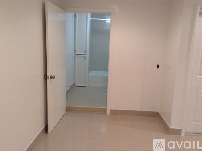 A room with a door and a window.