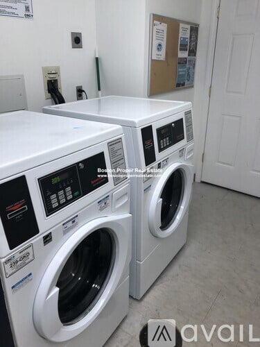 Two front loading washing machines are available for sale.
