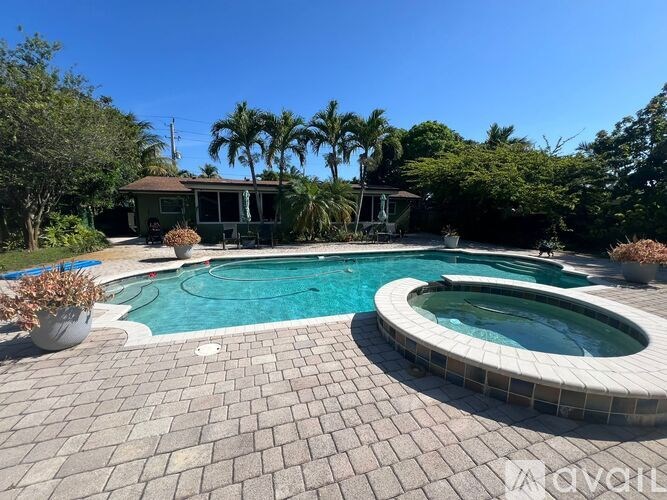A house with a pool in the backyard.