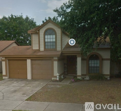 A two-car garage is attached to a house.