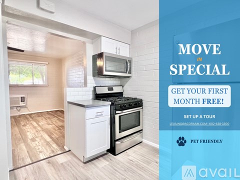 A kitchen with a stove, microwave, and oven is on sale for the first month free.