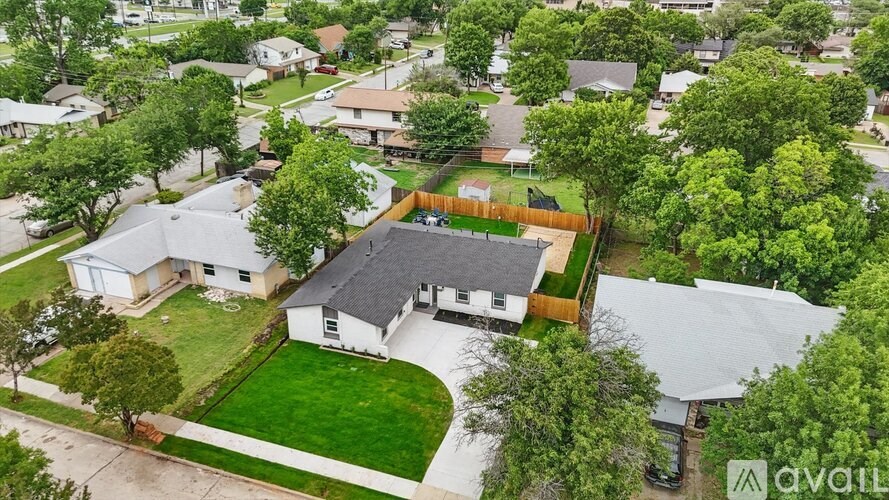 A house with a yard is for sale.