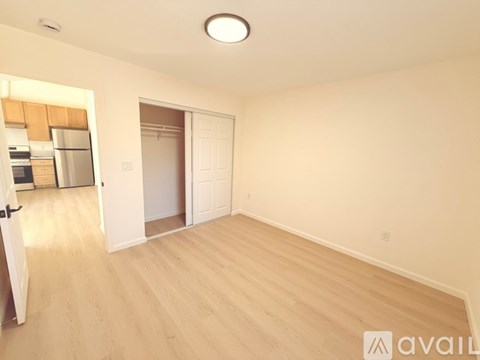 A room under construction with wooden framing and no walls.