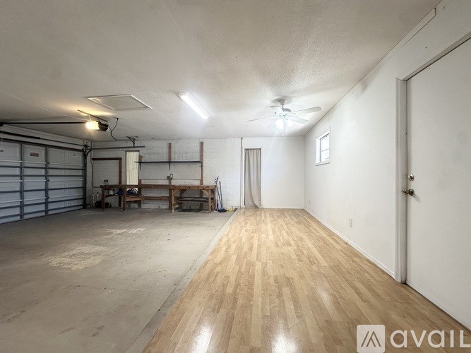 A house is situated on a dock over a body of water.