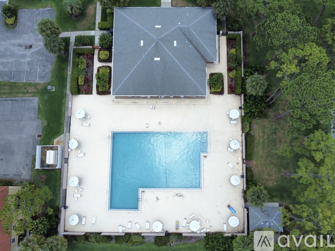 A house with a pool in the backyard.