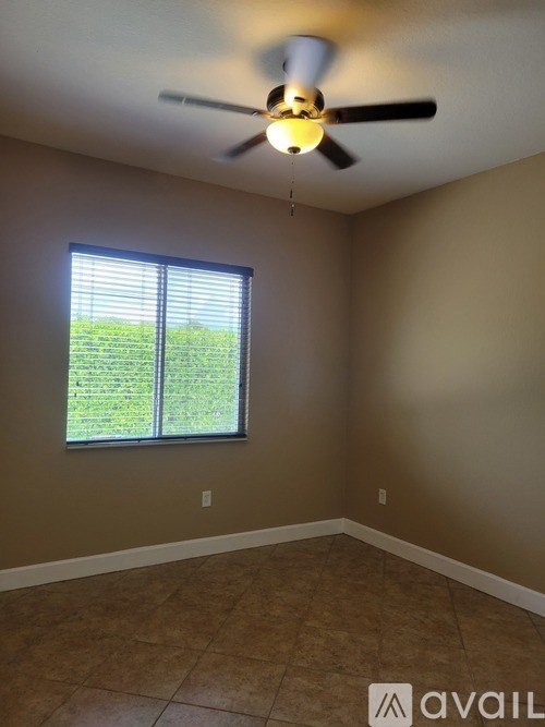 A kitchen with granite countertops and a stainless steel dishwasher.
