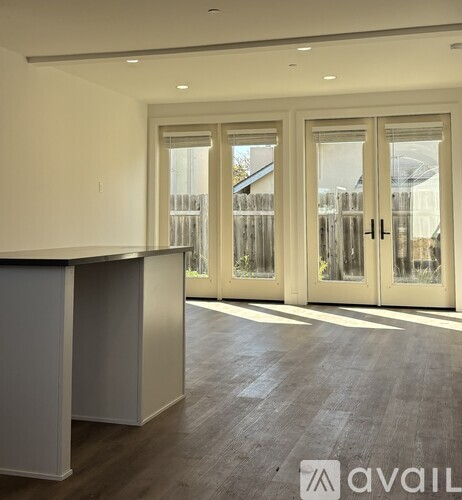 A floor plan of an apartment with two bedrooms, a living room, a kitchen, a bathroom, and a master bedroom.