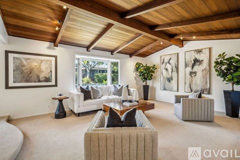 A living room with a sofa set and a coffee table.