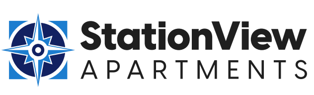 The image is a logo for Station View Apartments, featuring a compass design.
