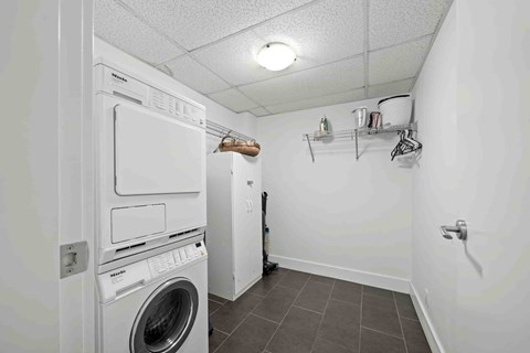 A laundry room with a washer and dryer.