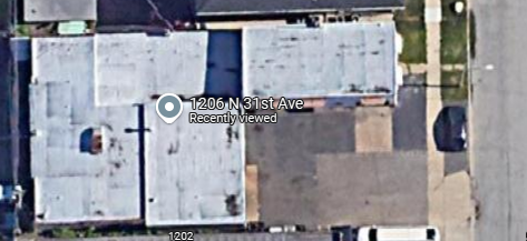A satellite image shows a building at 1206 N 31st Ave.