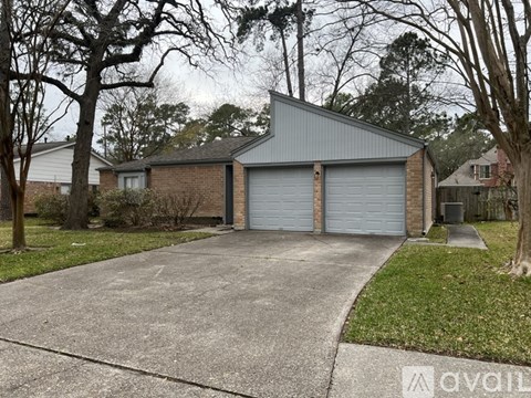A two-car garage is attached to a house.