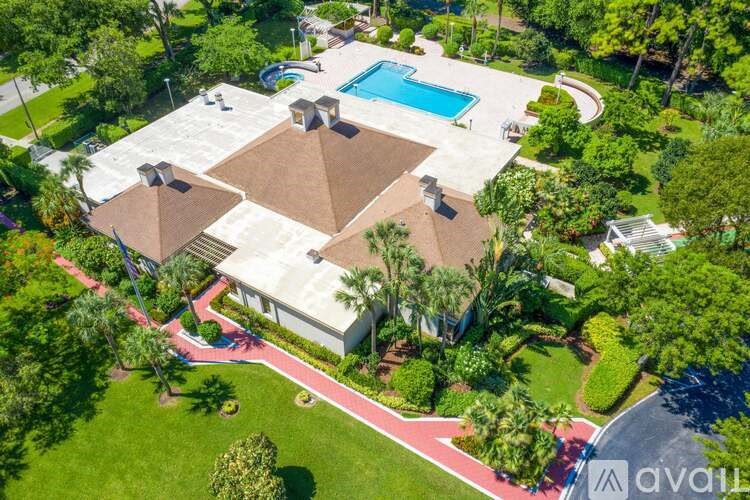 A large house with a pool in the backyard.