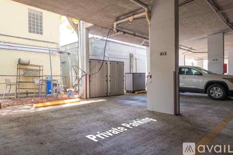 A parking garage with a sign that says "Private Patio".