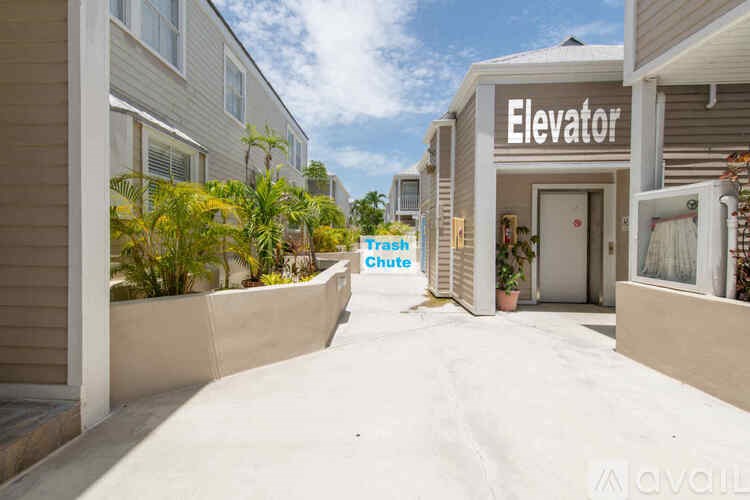 A sunny day at the Elevator apartment complex with a clear blue sky.