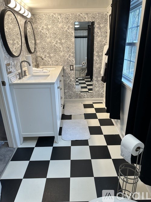 A black and white checkered bathroom floor.