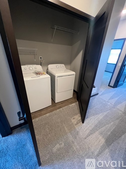 A laundry room with a washer and dryer.