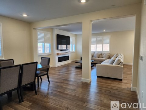A living room with a fireplace and a couch.