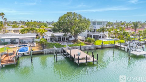 A house is available for rent on a waterfront property with a dock and a pool.