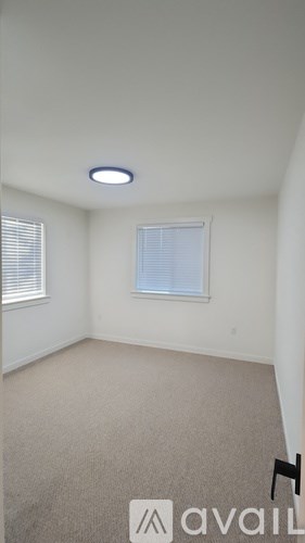 A bathroom with a tiled shower and a bathtub.