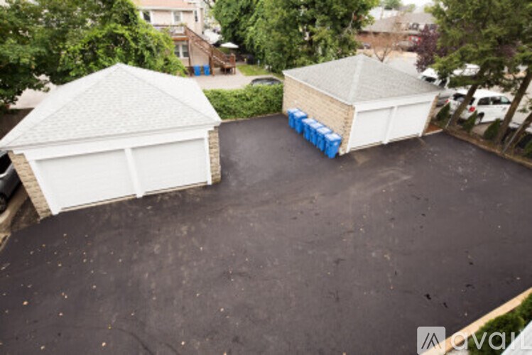 A white garage door is open.