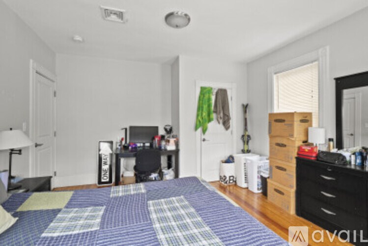 A room with a blue and white checkered carpet.