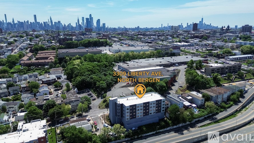 An aerial view of a city with a building at 3309 Liberty Ave, Ninth Bergen.