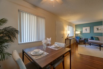 Dining Area Dining Area with Hardwood Inspired Floor, Wood Table, Chairs and Window Blinds - Photo Gallery 6