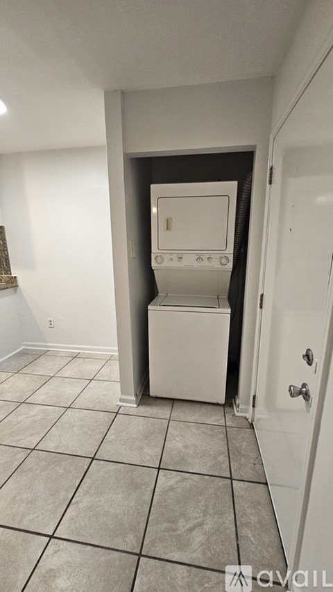 A white oven and microwave in a kitchen.