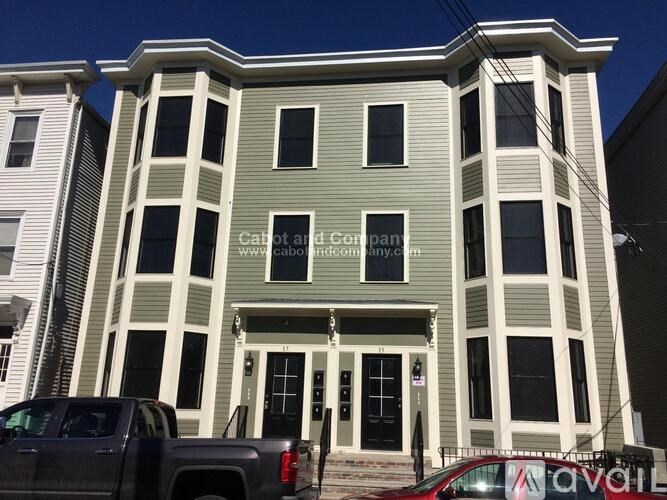 A building with the name "Cabot and Company" on it.