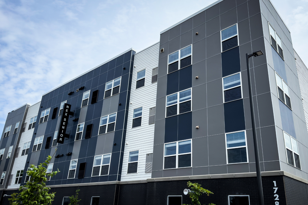 A modern building with a black and white facade.